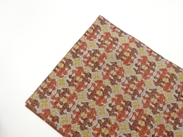  抽象向かい動物模様織出し開き名古屋帯（額縁仕立て）